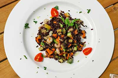 Black rice with shrimps and vegetables
